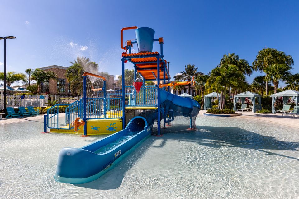 Children playing at the Solara splash pad and pool area